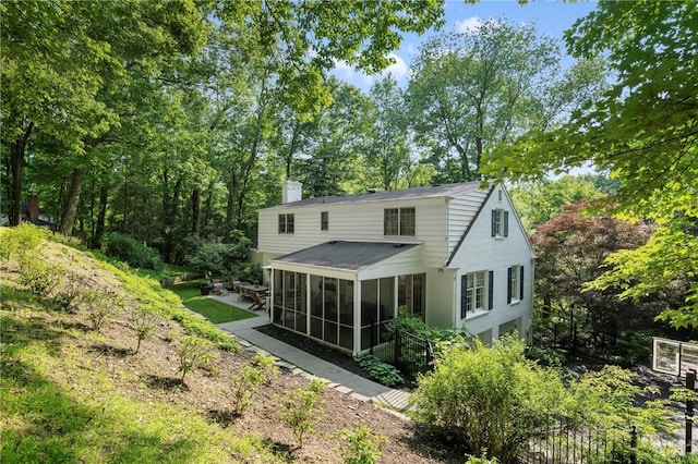306 Wildberry Rd, Fox Chapel, PA 15238 - back of property featuring a sunroom and a chimney