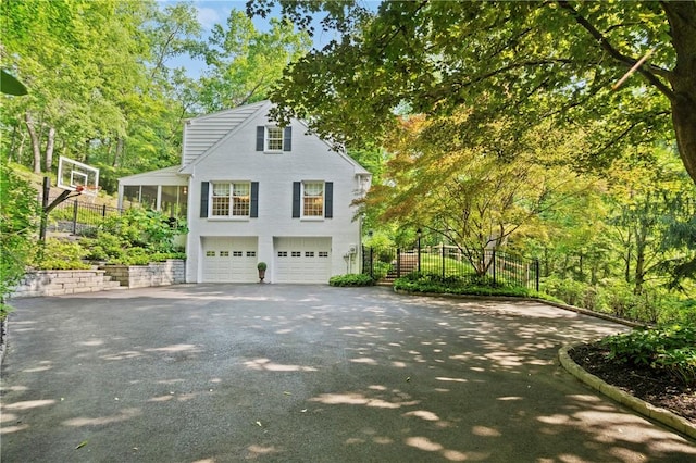 306 Wildberry Rd, Fox Chapel, PA 15238 - view of side of property with asphalt driveway and an attached garage