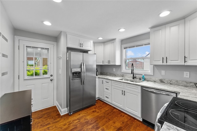 1368 Berryman Ave, South Park, PA 15129 - kitchen featuring stainless steel appliances, a sink, dark wood-type flooring, white cabinetry, and light stone counters