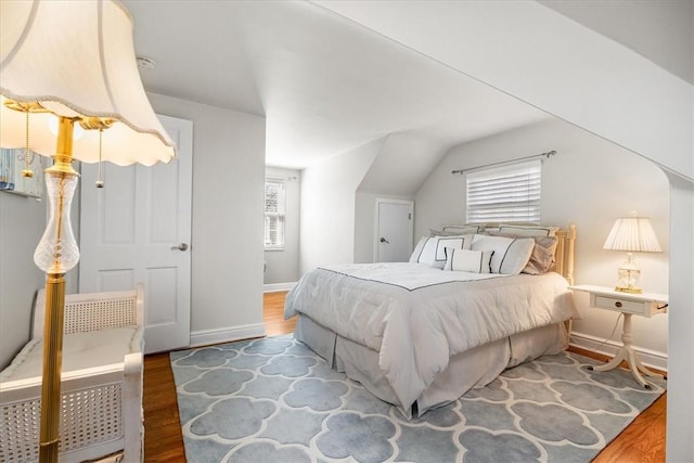 109 Parkview Rd, Ross Twp, PA 15237 - bedroom with wood finished floors, vaulted ceiling, and baseboards