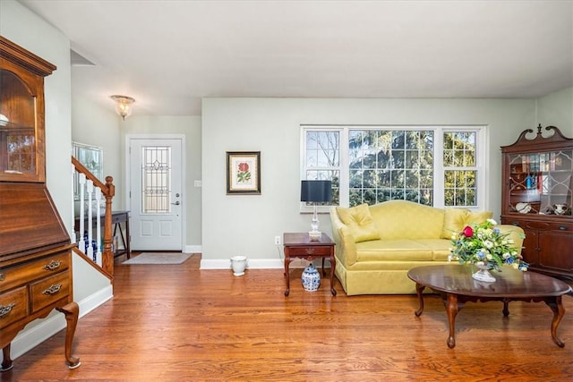 109 Parkview Rd, Ross Twp, PA 15237 - living room featuring wood finished floors, stairway, and baseboards