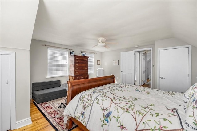 109 Parkview Rd, Ross Twp, PA 15237 - bedroom with light wood-type flooring, vaulted ceiling, a ceiling fan, and baseboards