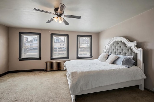 159 Jefferson Ave, Vandergrift Wml, PA 15690 - bedroom featuring radiator, carpet floors, baseboards, and a ceiling fan