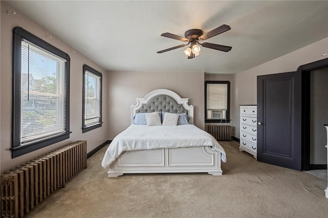 159 Jefferson Ave, Vandergrift Wml, PA 15690 - bedroom with radiator, light carpet, and a ceiling fan
