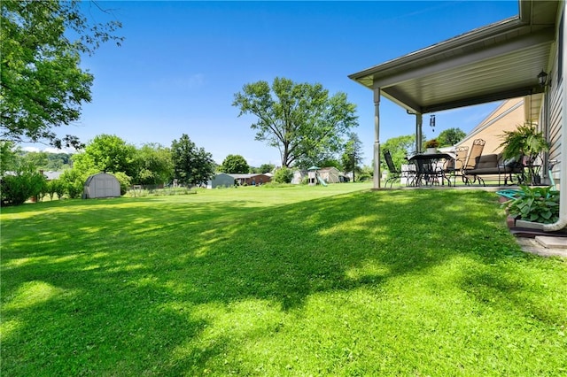 3028 Wachter Ave, Lower Burrell, PA 15068 - view of grassy yard featuring a patio area
