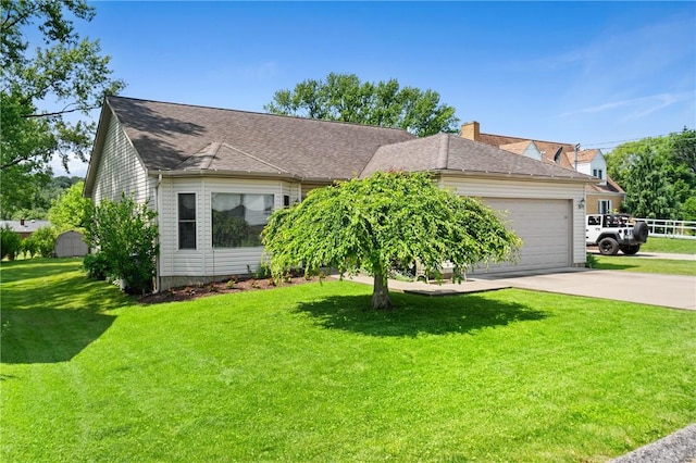 3028 Wachter Ave, Lower Burrell, PA 15068 - view of front of home with an attached garage, driveway, a front yard, and a chimney