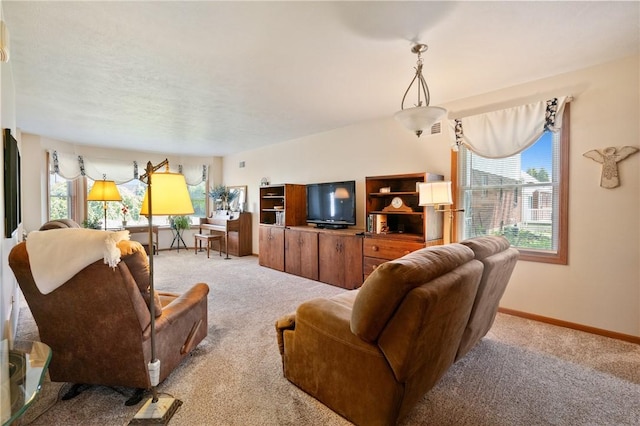 3028 Wachter Ave, Lower Burrell, PA 15068 - living room featuring light colored carpet and baseboards