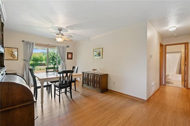 3028 Wachter Ave, Lower Burrell, PA 15068 - dining area featuring ceiling fan, light wood finished floors, and baseboards