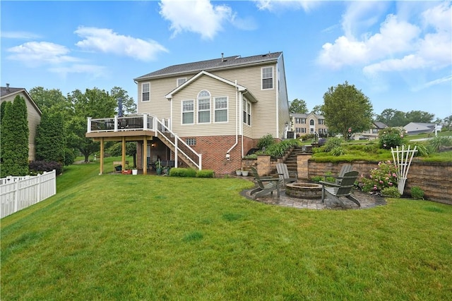 923 Arberdeen Dr, Hempfield Twp Wml, PA 15601 - back of property featuring stairway, an outdoor fire pit, a wooden deck, and a patio area