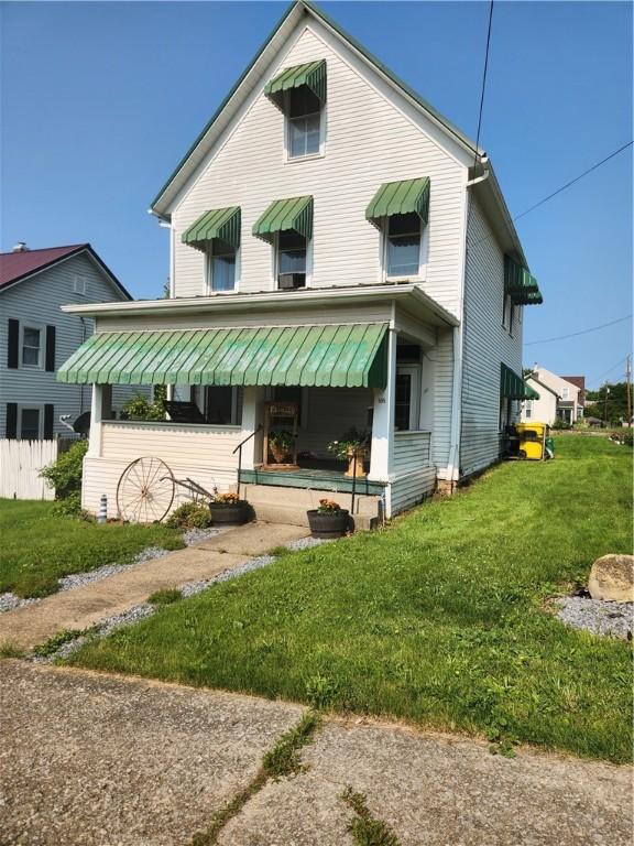 595 N Richhill St, Waynsbrg/Frankln Twp, PA 15370 - rear view of property with a lawn