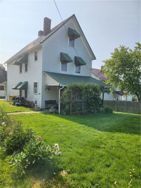 595 N Richhill St, Waynsbrg/Frankln Twp, PA 15370 - rear view of house featuring a chimney