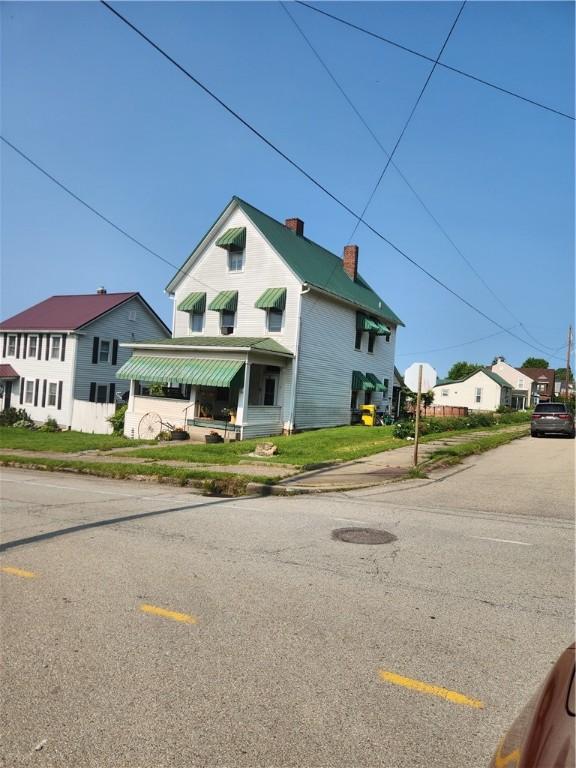 595 N Richhill St, Waynsbrg/Frankln Twp, PA 15370 - view of front facade with a chimney