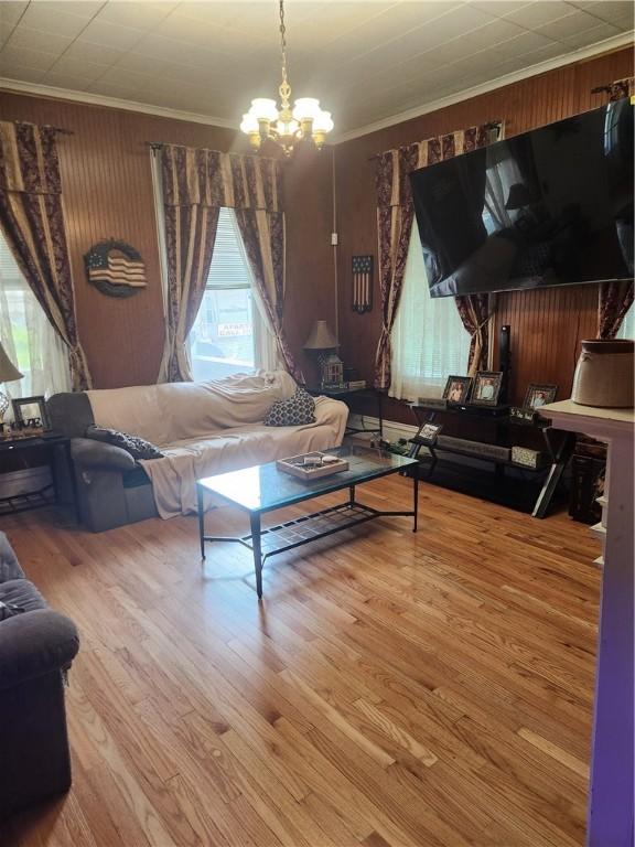 595 N Richhill St, Waynsbrg/Frankln Twp, PA 15370 - living area featuring a chandelier, ornamental molding, and wood finished floors