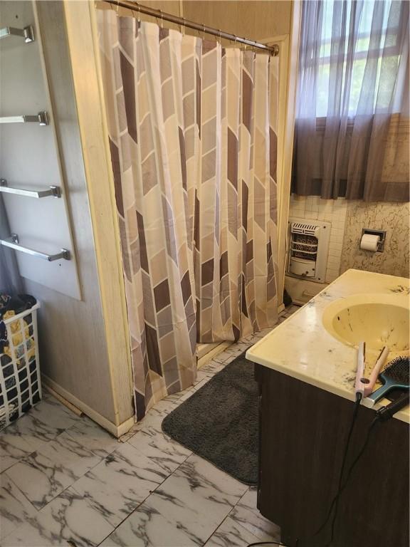 595 N Richhill St, Waynsbrg/Frankln Twp, PA 15370 - bathroom with heating unit, vanity, marble finish flooring, and a shower with shower curtain
