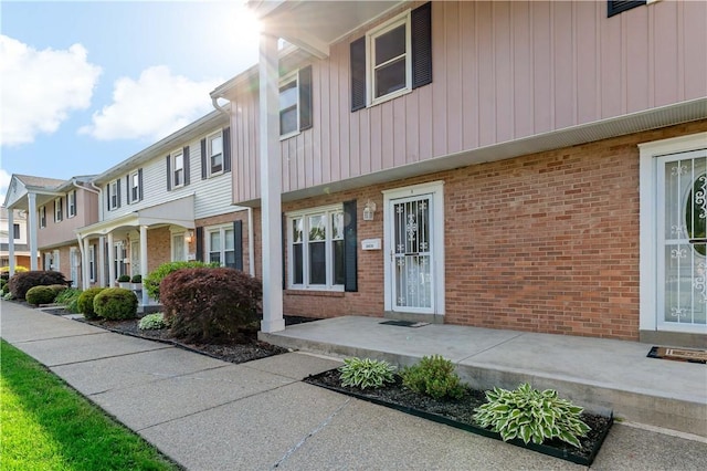 2603 19th St Unit E, Patterson Twp, PA 15010 - view of front of property with brick siding and board and batten siding