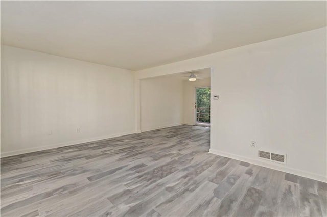 2603 19th St Unit E, Patterson Twp, PA 15010 - empty room with wood finished floors, baseboards, and a ceiling fan