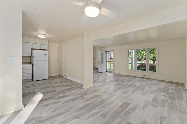 2603 19th St Unit E, Patterson Twp, PA 15010 - empty room with baseboards, light wood-style floors, and a ceiling fan