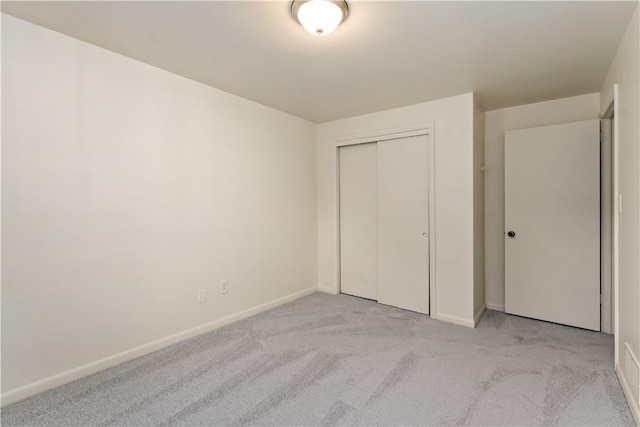 2603 19th St Unit E, Patterson Twp, PA 15010 - unfurnished bedroom with carpet, baseboards, and a closet
