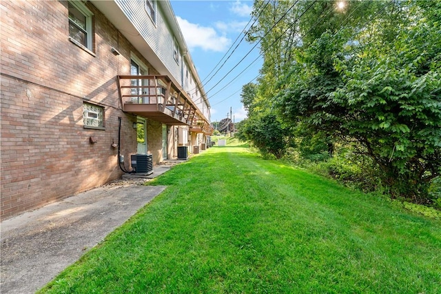 2603 19th St Unit E, Patterson Twp, PA 15010 - view of grassy yard featuring central AC unit