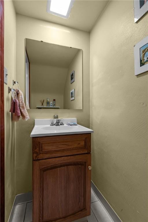 157 Kings Dale Rd, Churchill Boro, PA 15221 - bathroom featuring tile patterned flooring, vanity, and baseboards
