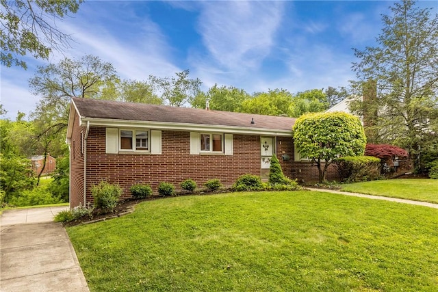 157 Kings Dale Rd, Churchill Boro, PA 15221 - view of front of property featuring brick siding and a front yard