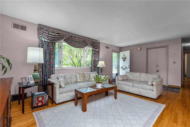 157 Kings Dale Rd, Churchill Boro, PA 15221 - living room featuring light wood finished floors and healthy amount of natural light