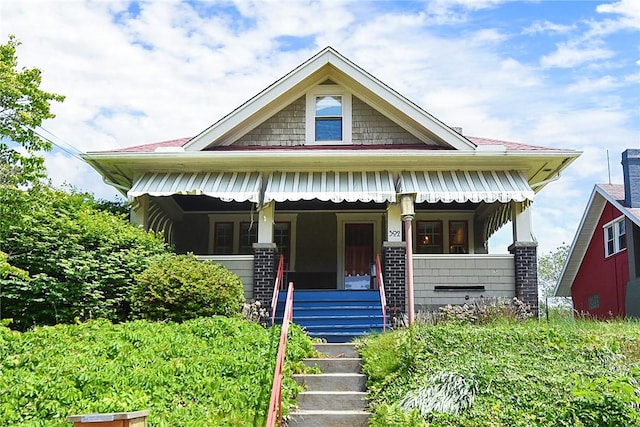 302 3rd St N, Versailles, PA 15137 - bungalow-style home with a porch