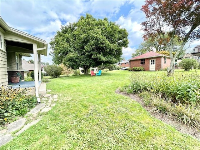 302 3rd St N, Versailles, PA 15137 - view of green lawn with a patio
