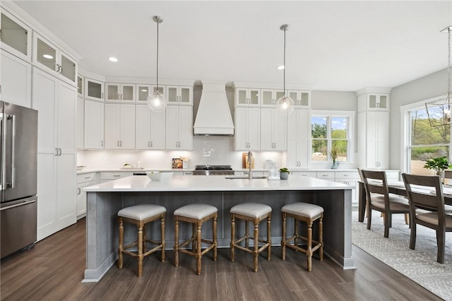 9660 Goehring Rd, Cranberry Twp, PA 16066 - kitchen with freestanding refrigerator, premium range hood, a sink, dark wood-style floors, and recessed lighting