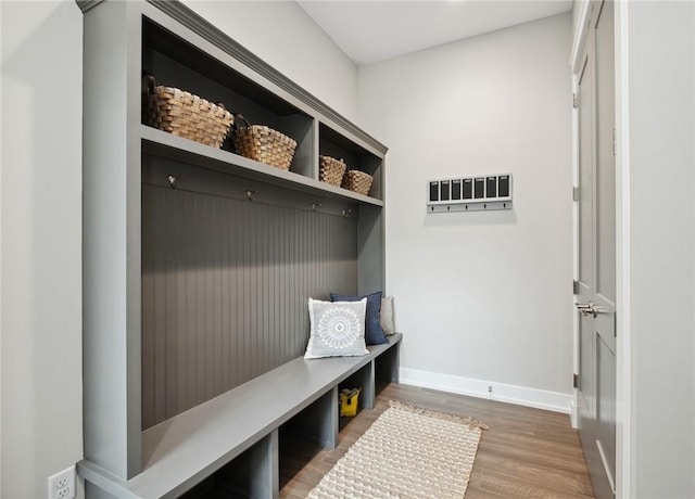 9660 Goehring Rd, Cranberry Twp, PA 16066 - mudroom featuring wood finished floors and baseboards
