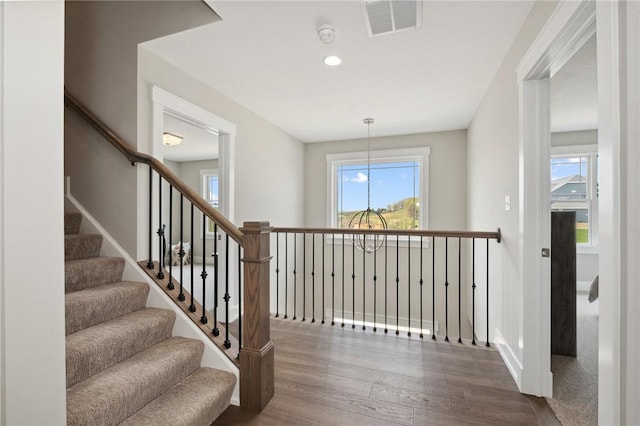 9660 Goehring Rd, Cranberry Twp, PA 16066 - stairway with wood finished floors, healthy amount of natural light, baseboards, and recessed lighting