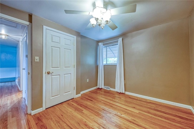 111 York Way, Center Twp Bea, PA 15061 - unfurnished bedroom featuring light wood-style flooring, baseboards, a ceiling fan, and attic access