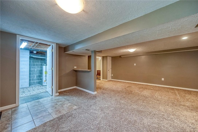 111 York Way, Center Twp Bea, PA 15061 - finished below grade area with a textured ceiling, water heater, baseboards, and carpet