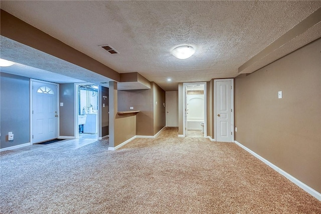 111 York Way, Center Twp Bea, PA 15061 - finished below grade area featuring light carpet, baseboards, and a textured ceiling