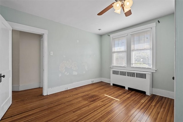 3565 Gerber Ave, Brighton Heights, PA 15212 - empty room with radiator, wood-type flooring, ceiling fan, and baseboards