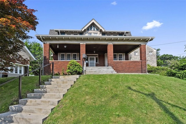 3565 Gerber Ave, Brighton Heights, PA 15212 - view of front facade with covered porch, a front lawn, and brick siding