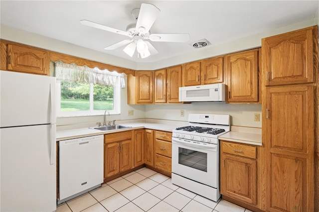 652 Westland Dr, Richland, PA 15044 - kitchen featuring white appliances, a sink, light countertops, and brown cabinetry