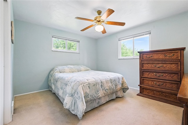 652 Westland Dr, Richland, PA 15044 - carpeted bedroom featuring multiple windows, baseboards, and a ceiling fan