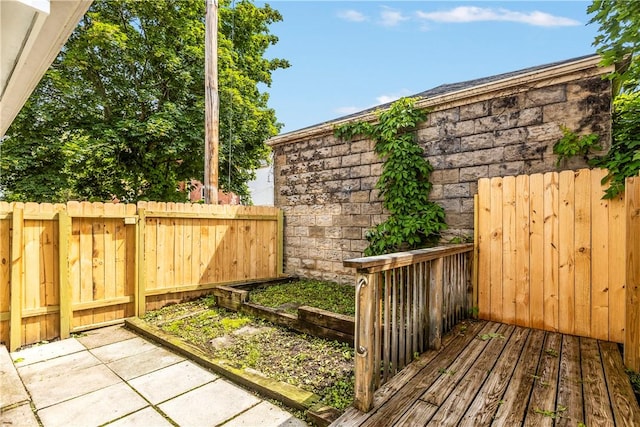 213 Highland Ave, Pitcairn, PA 15140 - wooden terrace featuring a patio