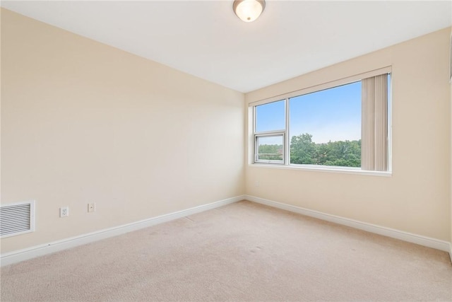 5570 Centre Ave Unit 306, Shadyside, PA 15232 - unfurnished room with light colored carpet and baseboards