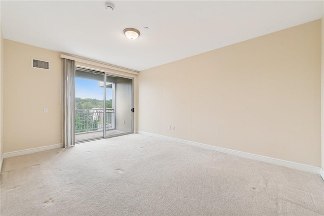5570 Centre Ave Unit 306, Shadyside, PA 15232 - unfurnished room with carpet and a smoke detector