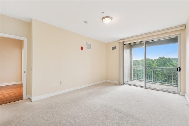 5570 Centre Ave Unit 306, Shadyside, PA 15232 - unfurnished room with light carpet and baseboards