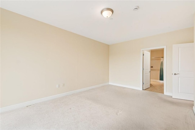 5570 Centre Ave Unit 306, Shadyside, PA 15232 - unfurnished room with light colored carpet and a smoke detector