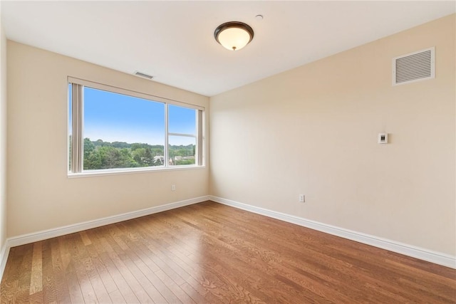 5570 Centre Ave Unit 306, Shadyside, PA 15232 - spare room with hardwood / wood-style floors and baseboards