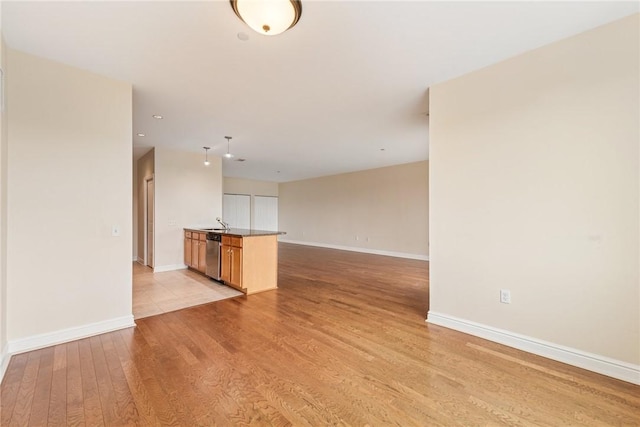 5570 Centre Ave Unit 306, Shadyside, PA 15232 - unfurnished living room featuring light wood-type flooring and recessed lighting