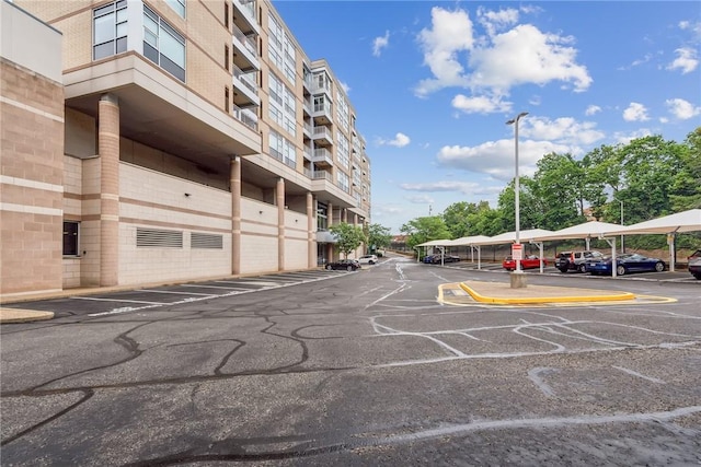 5570 Centre Ave Unit 306, Shadyside, PA 15232 - view of apartment building / complex with uncovered parking