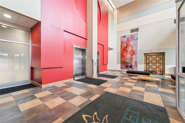 5570 Centre Ave Unit 306, Shadyside, PA 15232 - building lobby featuring a high ceiling and recessed lighting