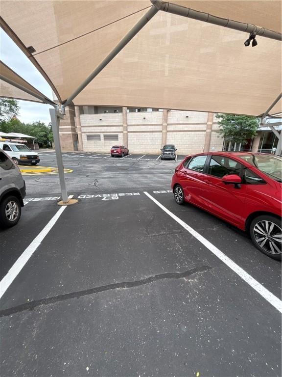 5570 Centre Ave Unit 306, Shadyside, PA 15232 - view of partially covered parking lot