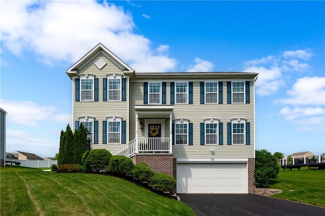 132 Naughton Cir, Forward Twp But, PA 16033 - view of front facade featuring a garage, a front yard, and driveway