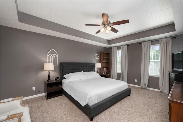 132 Naughton Cir, Forward Twp But, PA 16033 - bedroom with baseboards, a raised ceiling, carpet, and a ceiling fan